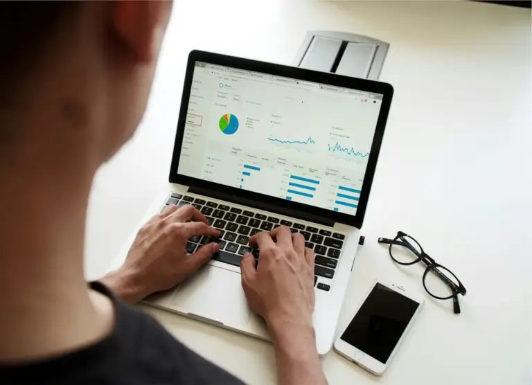 A person reviewing analytics on a laptop
